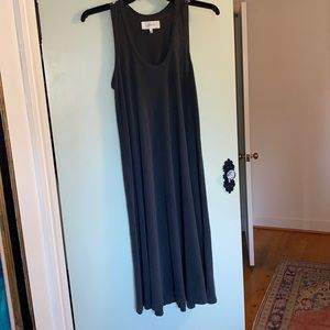 Midi razorback swing dress in gray.